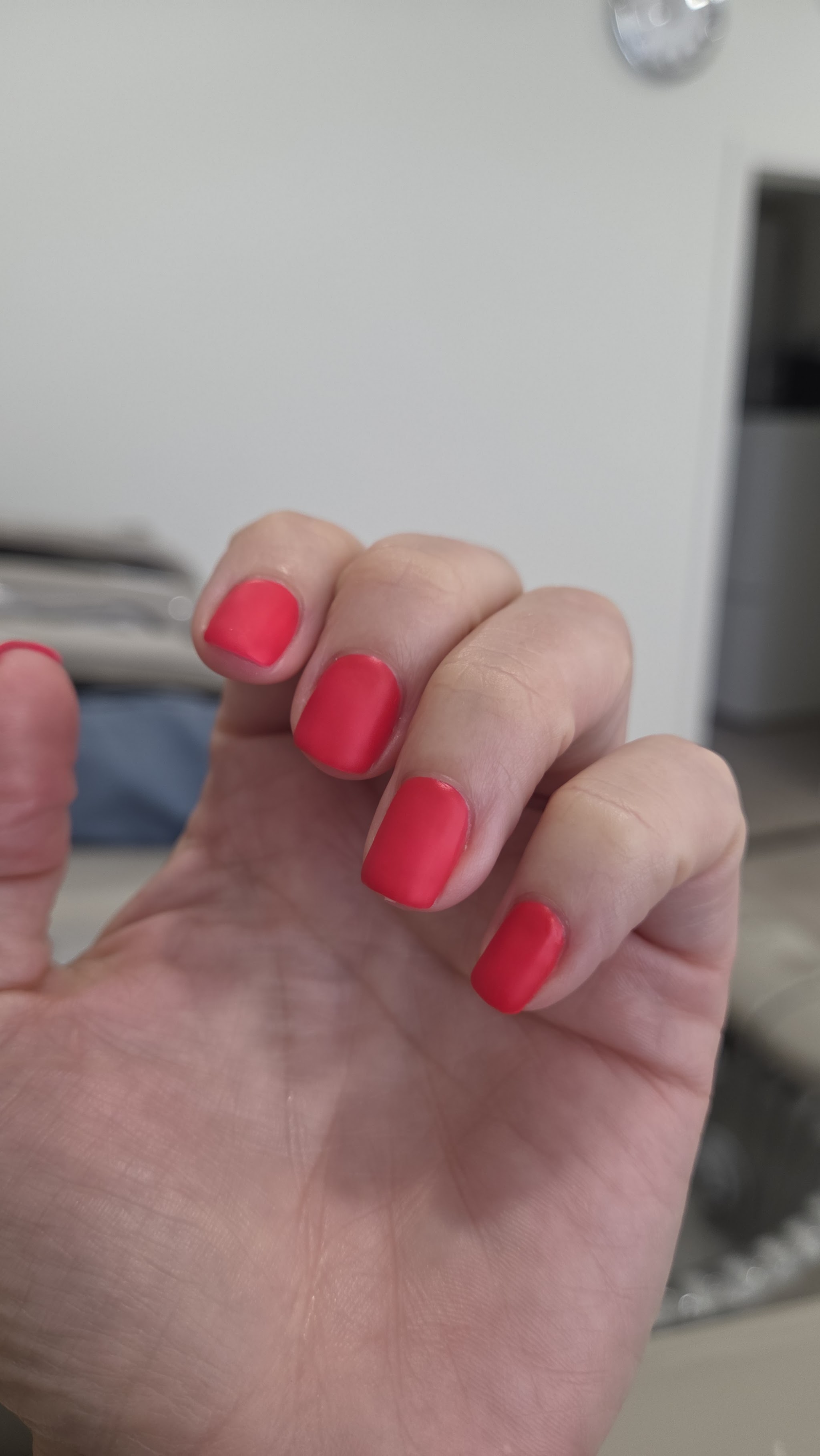 Afgewerkte rode manicure